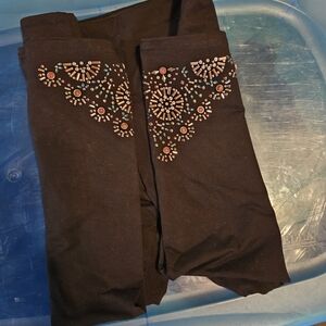 Intro. Black Leggings with Orange and White Embellishments